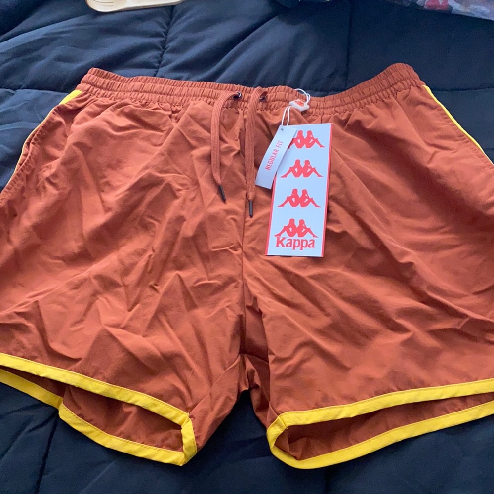 Men’s drawstring waist swim trunks.
